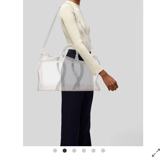Louis Vuitton
PVC Epi Plage Wavy Keepall Bandouliére Shoulder Bag - Picture 1 of 13